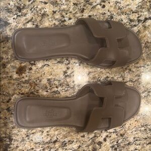 Gray Hermes-style Oran sandals